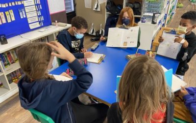 Imagine walking through the front door and landing yourself right in a classroom where students are dispersed across an open space, independently working with supplies spread across their table. 