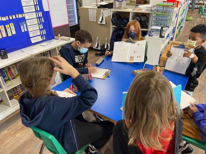 Imagine walking through the front door and landing yourself right in a classroom where students are dispersed across an open space, independently working with supplies spread across their table. 